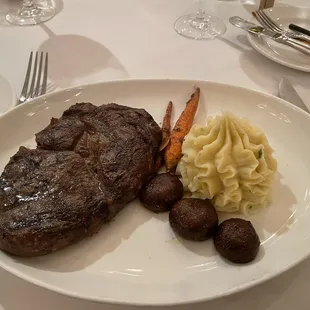 Ribeye with fancy piped potatoes.