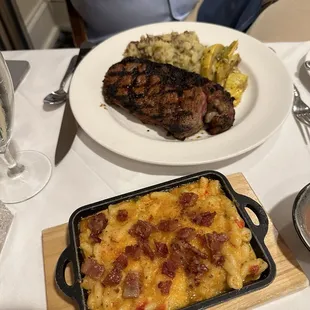 Mac and cheese and 12 ounce ribeye