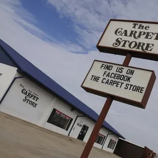 a sign for the carpet store