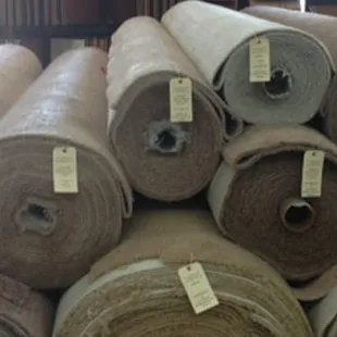 several rolls of carpet