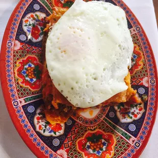 Chilaquiles with a fried egg and chorizo