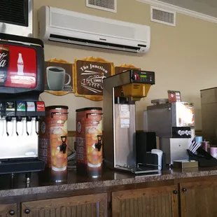 a coffee machine and a soda machine