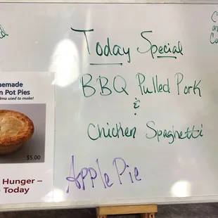 a whiteboard with a menu on it