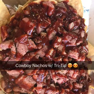 Cowboy Nachos with tri-tip over some of the best baked beans you will ever try!