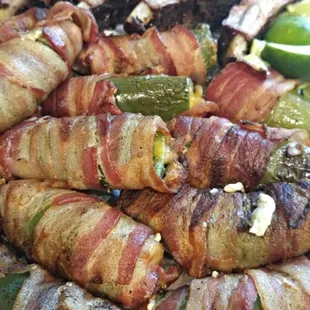 Bacon Wrapped Jalapenos poppers with Cheddar and Cream Cheese!