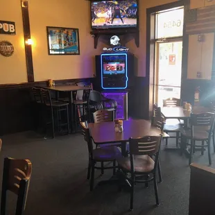 a game machine in the middle of the room