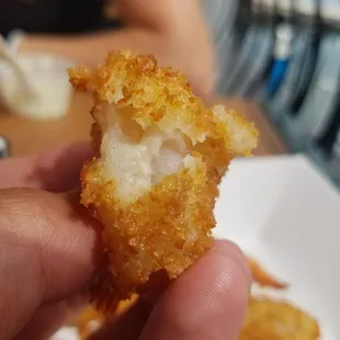The batter is not cooked and the shrimp was super undercooked and slimy.