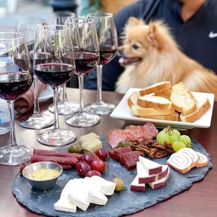 Cheese + meat plate (cabra al vino, mozzarella wrapped Prosciutto, brie + duck pate, salami, soppresseta)