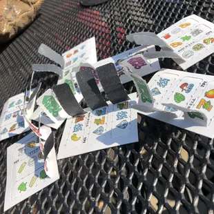a bunch of tags on a table