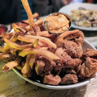 October 31, 2023; Kids size chicken poppers and fries ($11).