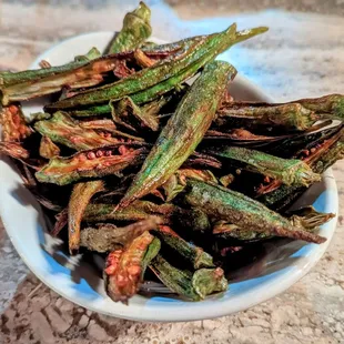 October 31, 2023; Pan fried okra ($9).