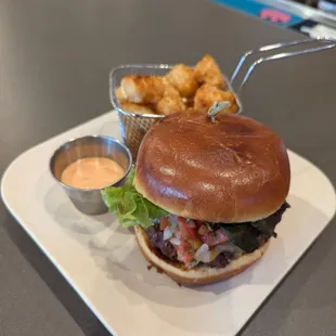 Southwest style!  Choose burger or chicken topped with housemade salsa, quac, lettuce, Boom Boom sauce, on a locally sourced brioche bun.