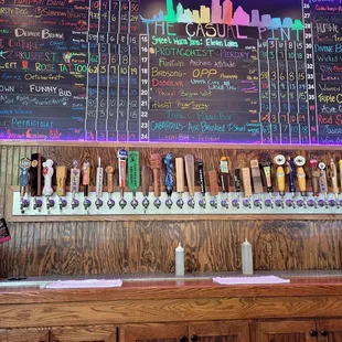 a variety of beers on the bar