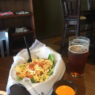 Ole&apos;salad with boom boom sauce on the side (they also make as a wrap) and a pint of good people winter Amber