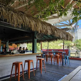 a tiki bar on a deck