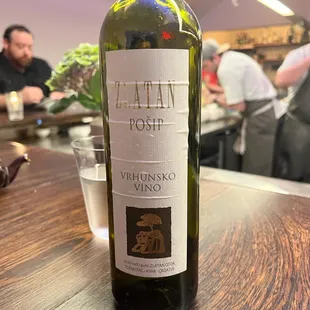 a bottle of wine on a table