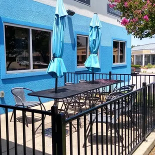 A colorful paint that looks good next to the tree.