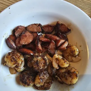 Extra Shrimp that wasn&apos;t in the &quot;Shrimp&quot; pasta and some extra sausage for some reason.
