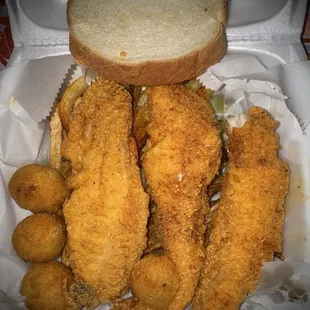 3 Catfish fillets w/fries and bread (extra seasoning on all), plus 4 jalapeño hushpuppies
