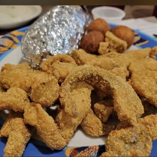 Fried catfish, hush puppies and  Baked Potato