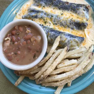 Blue Tortilla Beef Enchiladas covered in Queso, fries and boracho beans.