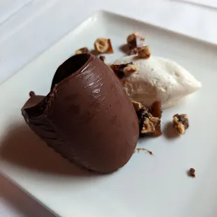 a chocolate dessert on a white plate