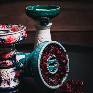 a close up of a bowl and a bowl of dried cranberries