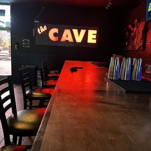 a bar with red lights