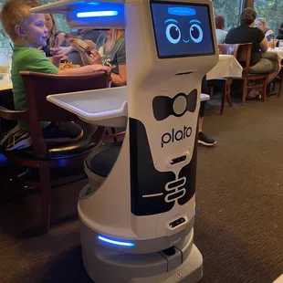 a robot in a restaurant