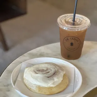 a cinnamon roll and iced coffee
