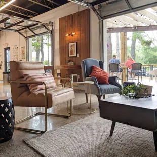 a living room with a view of the outdoors