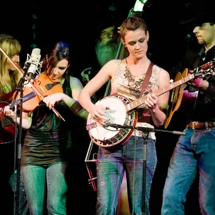 a group of people playing instruments