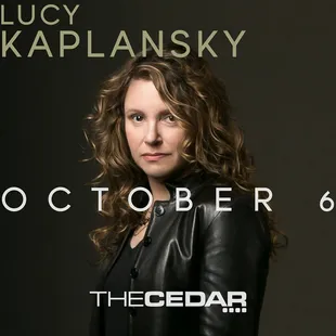 a woman in a leather jacket