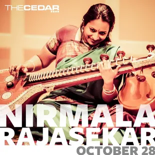 a woman playing a sitar