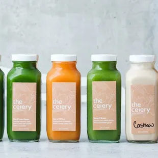 a row of juice bottles