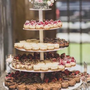 a tiered display of cheesecakes