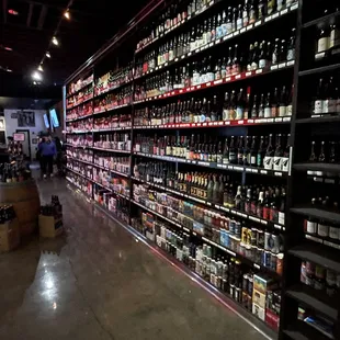 Wall of beer and wine for sale.