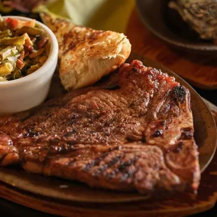 T-Bone, baked potato &amp; garlic bread - Photos taken by @heydarlingstudio on IG