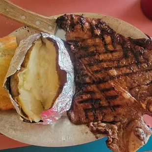 16oz T-Bone, baked potato &amp; garlic bread.