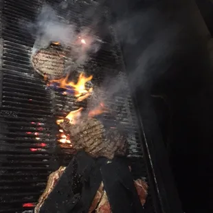 smoke coming out of the grill