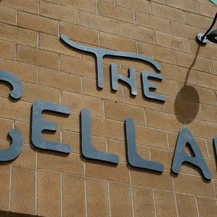 the sign on the outside of the building
