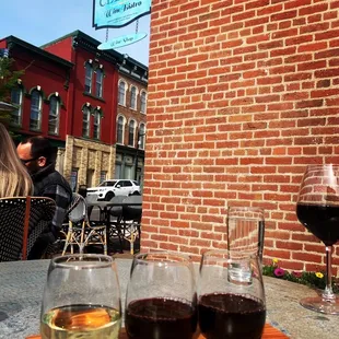 three glasses of wine on a table
