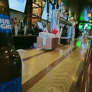 a bottle of beer on the bar