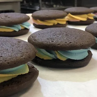 Cauldron Cakes, featuring Rainbow Flavor (citrus almond buttercream, with a Guinness chocolate shell)