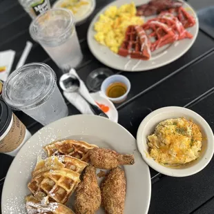 a plate of waffles and eggs