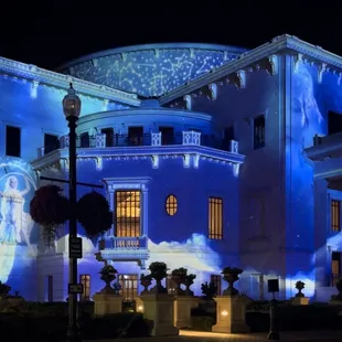 a building with a projection of an angel