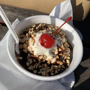 n ice cream sundae with a cherry on top