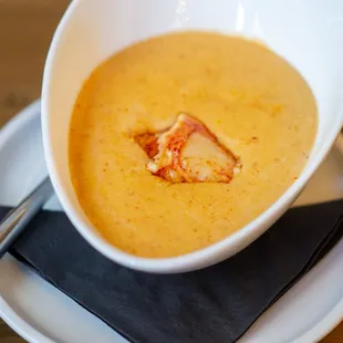 a bowl of soup on a plate