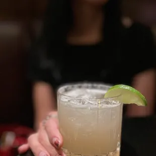 A beauty demos a classic craft margarita made with fresh squeezed limes and a custom syrup with Jalisco tequila ($16) 5/2023