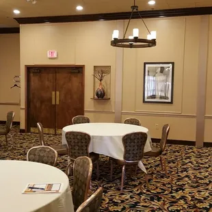 Another view of The Club room prior to our Christmas party. The shelf to the right of the doors opens to the back of the bar. So convenient!